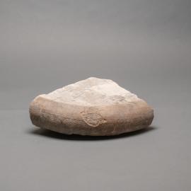Stone column base fragment